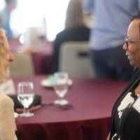 faculty sitting and chatting
